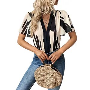 Elegant V-neck short sleeve bodysuit with black and white abstract geometric pattern