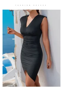 Detail of black V-neck sleeveless dress featuring elegant ruched waist and asymmetric hem