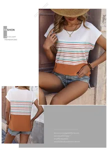 Close-up of color-block striped t-shirt with orange panel and soft knit texture