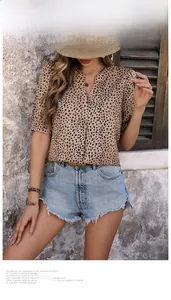 Detail of a casual V-neck leopard print shirt with short sleeves for summer fashion