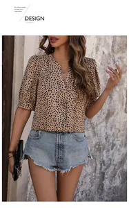 Detail of a casual V-neck leopard print blouse with stylish puff sleeves for women