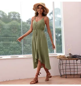 Detail view of the grass green V-neck dress with buttons and adjustable drawstring waist