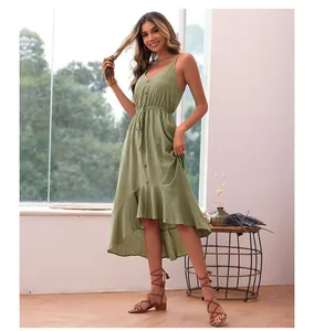 Detail of green ruffle hem cotton linen dress with V-neck and drawstring waist