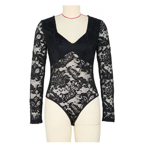 Detail of floral lace texture and deep V-neckline on this black long sleeve bodysuit