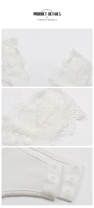 Vue détaillée du body en dentelle blanche montrant les motifs floraux et les boutons