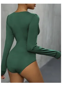 Detail view of the back of a dark green long-sleeve bodysuit with lace V-neck stitching
