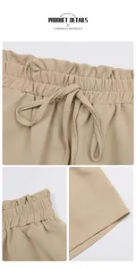 Detail of khaki drawstring waist shorts showing elastic waistband and fabric texture