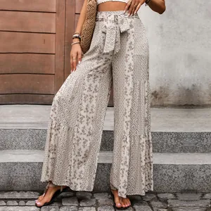 High waist bohemian wide leg trousers with floral print and tie belt for summer vacations