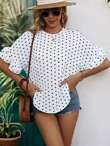Polka dot short sleeve blouse with ruffle sleeves and round neck for summer wear
