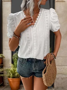 Women's elegant white V-neck lace blouse with short puff sleeves and hollow embroidery