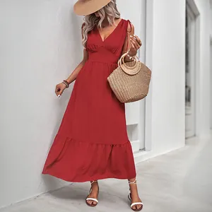 Elegant red V-neck sleeveless maxi dress with ruffled hem and backless summer design