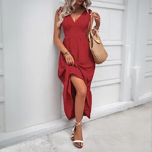 Elegant red V-neck backless maxi dress with side slit and shoulder ties for summer vacations
