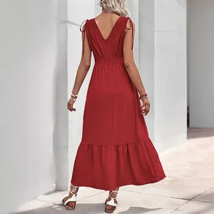 Elegant red backless maxi dress with ruffled hem and adjustable shoulder ties for summer