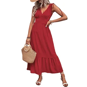Elegant red V-neck maxi dress with tie shoulder straps and ruffled hem for summer vacation