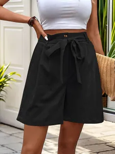 Women's black high-waist shorts featuring a waist tie and pleated loose fit design