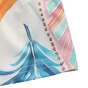 Detailed macro view of colorful feather print and double needle stitching on polyester fabric