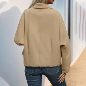 Women's camel polar fleece jacket with lapel collar and horn buttons, back view