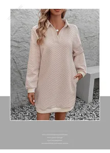 Detail of quilted diamond texture on pink long sleeve polo dress with ribbed cuffs