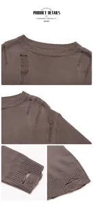 Detailed view of the distressed knit texture and ribbed cuffs on this casual crewneck sweater