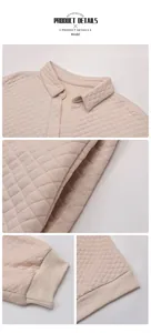 Detail view of beige quilted texture fabric with ribbed cuffs and polo neckline