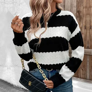 Women's crew neck sweater with classic black and white horizontal stripes in knit fabric