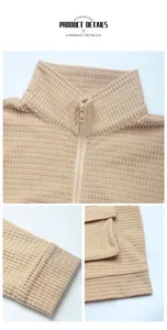 Close-up of khaki waffle textured fabric with zipper stand collar and cuff details