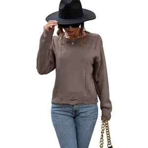 Distressed brown crewneck knit sweater for women with loose fit and street style rips