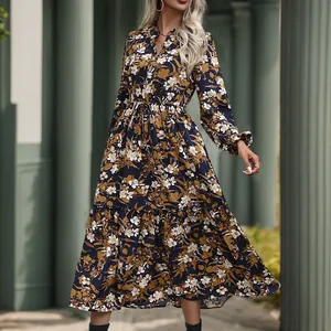 Detail of elegant V-neck floral midi dress with drawstring waist and ruffle hem detail