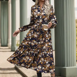 Detail of V-neck button closure and drawstring waist on vintage floral maxi dress