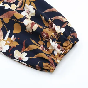 Close-up of elastic ruffled cuffs on a vintage floral print long sleeve dress