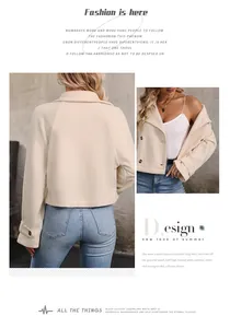 Detailed view of women's cream cropped tweed jacket showing lapels and double-breasted buttons