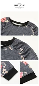 Dettagli delle maniche raglan con pieghe e stampa floreale su felpa grigio scuro