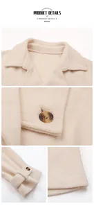 Detail view of beige wool-like jacket showing amber buttons and cuff strap texture