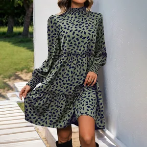 Olive green floral mini dress with lantern sleeves and ruffled hem details