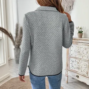 Gray waffle knit pullover sweatshirt with V-neck zipper and stylish quilted texture