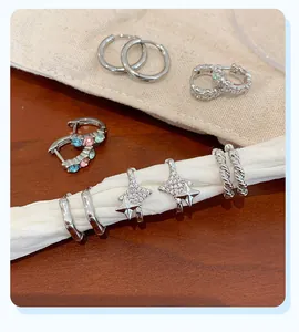 Collection of silver copper earrings with micro-inlaid zircon in various stylish designs