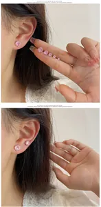 Comparison of various sizes of pink zircon stud earrings with classic four-prong setting