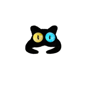 Cute black flocked cat ring with heterochromia cat eyes and adjustable open band