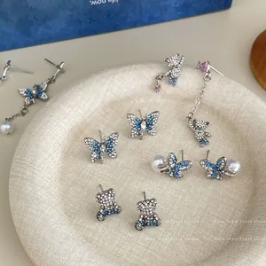Blue zircon teddy bear and butterfly earrings set with silver needles for women