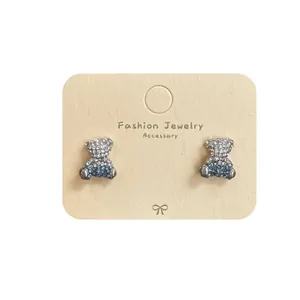 Sparkling blue and white crystal teddy bear stud earrings with silver pins for women