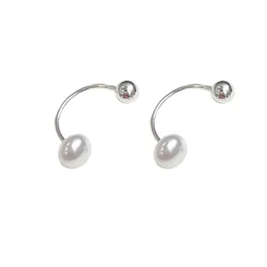 Minimalist silver U-shaped ear cuffs with white pearls and polished metal beads