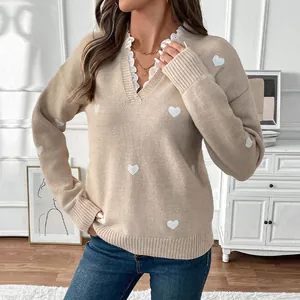 Women's beige heart print knit sweater with V-neck lace trim and ribbed cuffs