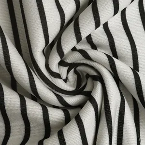 Macro shot of high-quality black and white striped fabric with fine woven texture