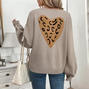 Beige oversized knit cardigan with leopard heart print on the back and v-neck line