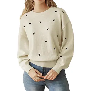 Chic cream crew neck sweater for women with black heart patterns and long sleeves