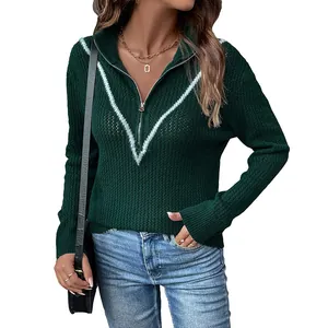 Dark green knit pullover with half-zip collar and white V-pattern for winter fashion