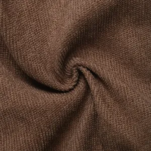 Close-up of brown pleated corduroy fabric texture for high-waisted mini skirts