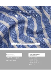 Detailed macro view of blue and white pinstripe fabric texture for summer jumpsuit