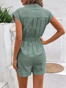 Detail of the back view of a green striped romper with elastic waist and box pleat design