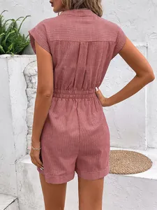 Detailed back view of a striped romper with elastic waist and rolled hem in brick red color